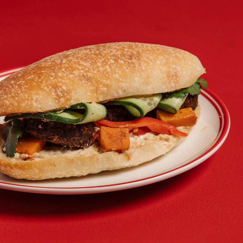 Falafel, roast pumpkin and capsicum, fresh coriander, cucumber and hummus on a Humble ciabatta.