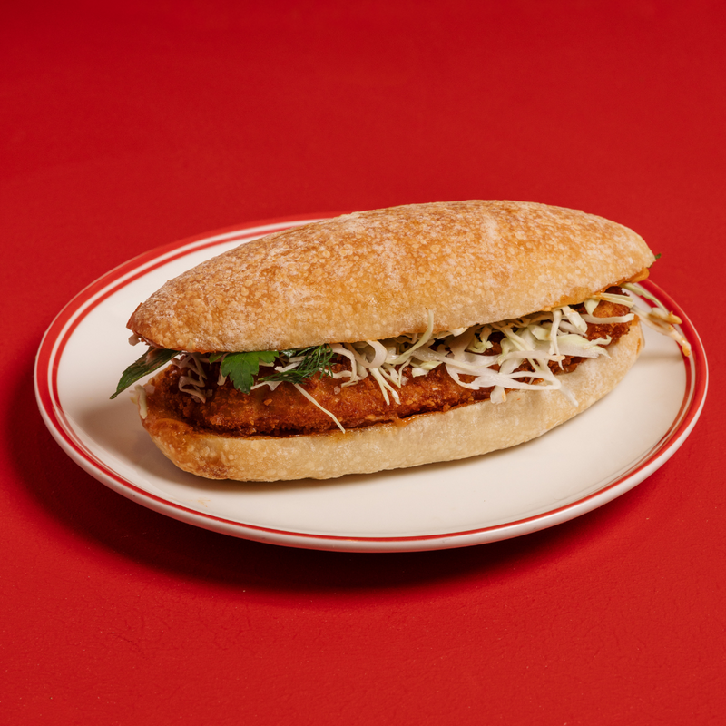 Crispy chicken schnitzel, white cabbage, house-made golf sauce, fresh Humble ciabatta roll
