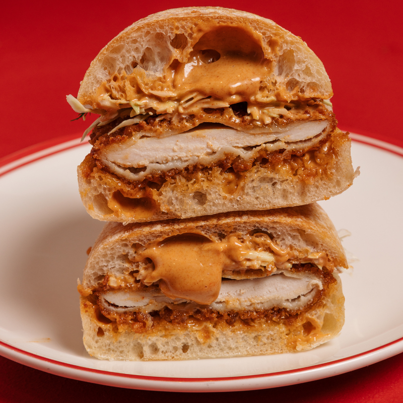 Crispy chicken schnitzel, white cabbage, house-made golf sauce, fresh ciabatta roll